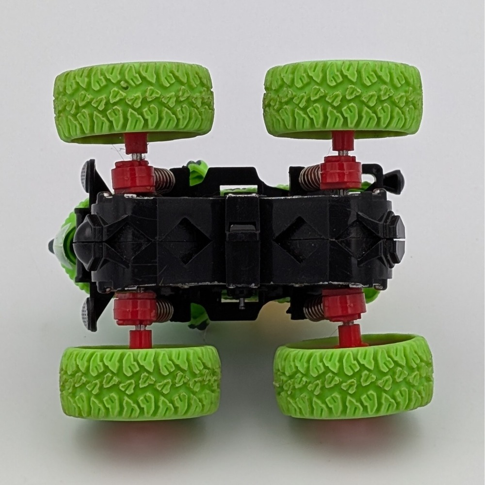 Dinosaur Monster Truck Triceratops Green Friction Powered Toy with Suspension - Picture 3 of 5